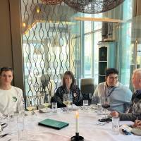 Geography students and professors at a restaurant